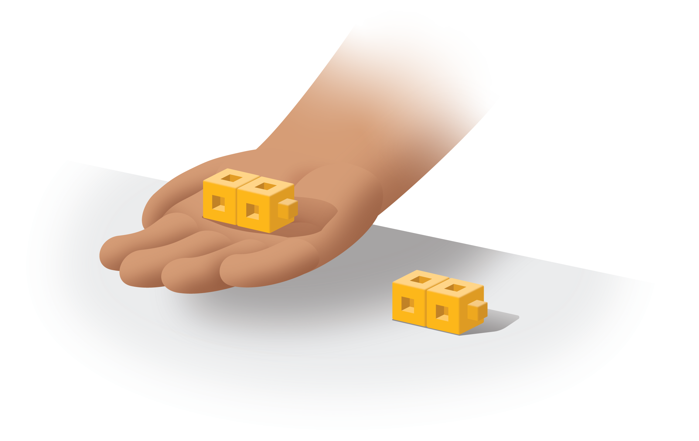 Connecting cubes. 2 in hand, 2 on the desk.