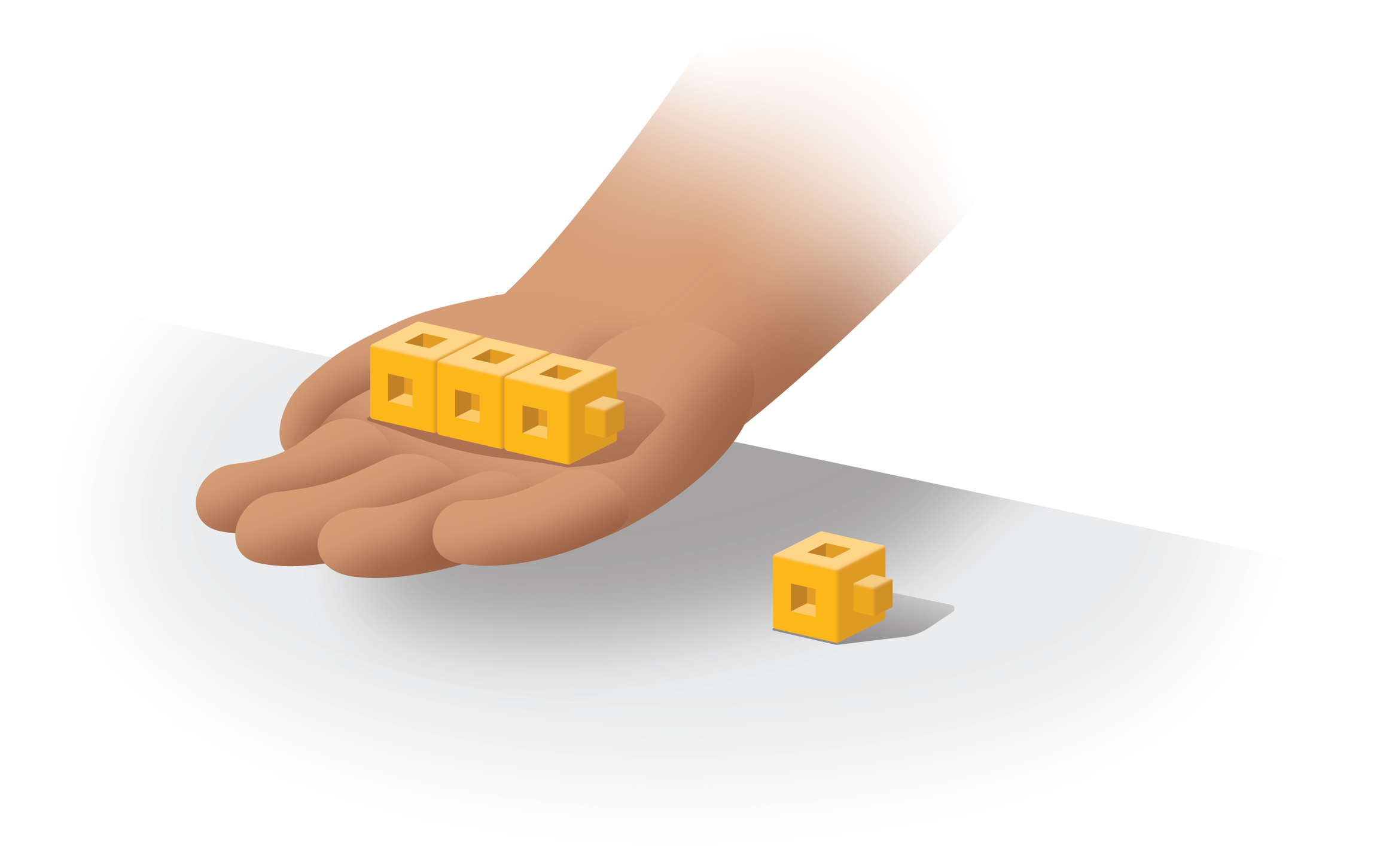 Connecting cubes. 3 in hand, 1 on desk.