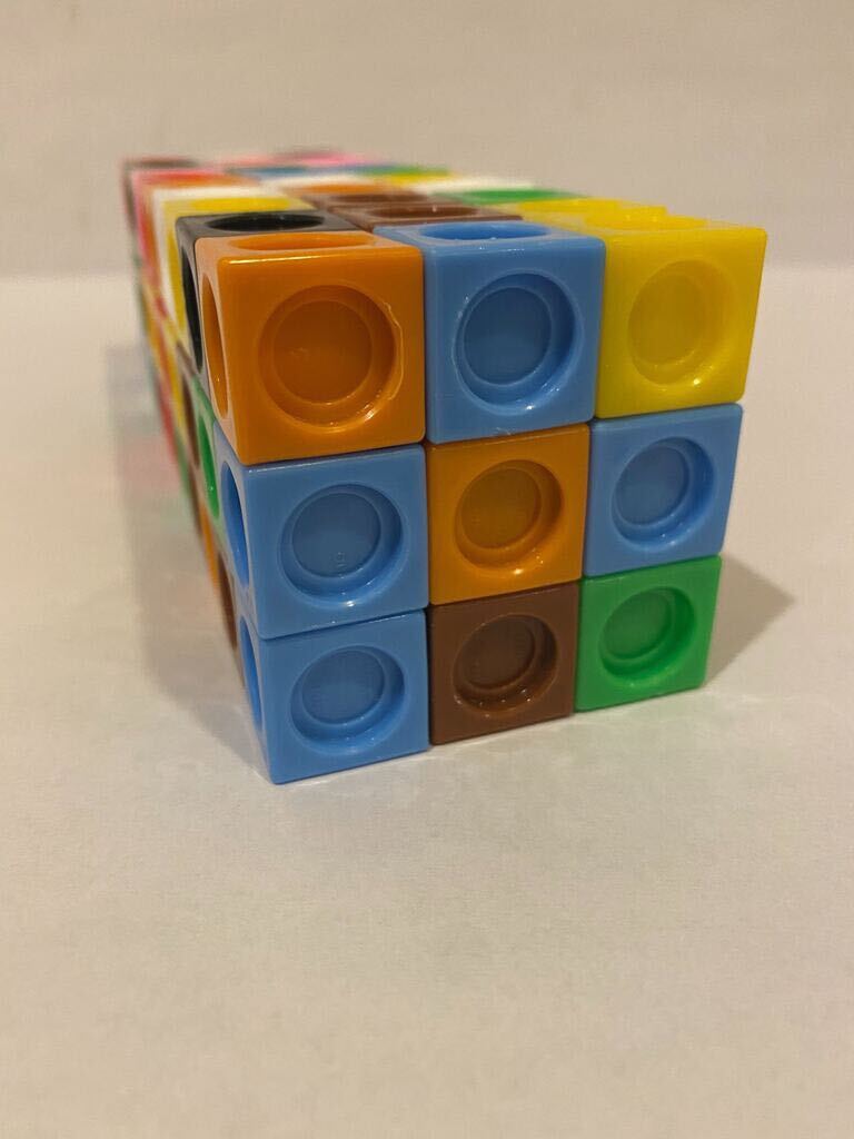 Rectangular prism. 3 cubes by unknown number between 8 to 10 cubes. Height is 3 cubes.