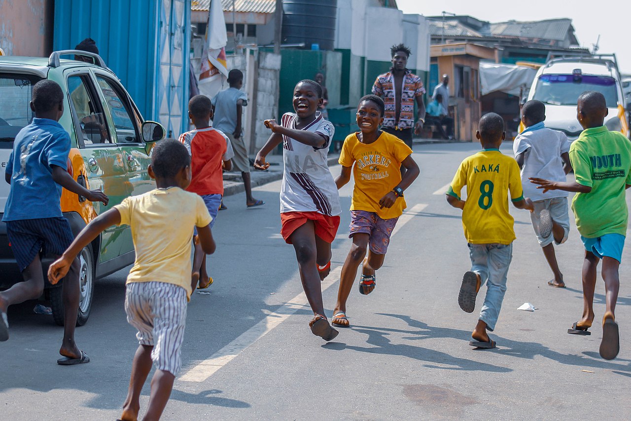 Children in Ghana playing a game of Pilolo.
