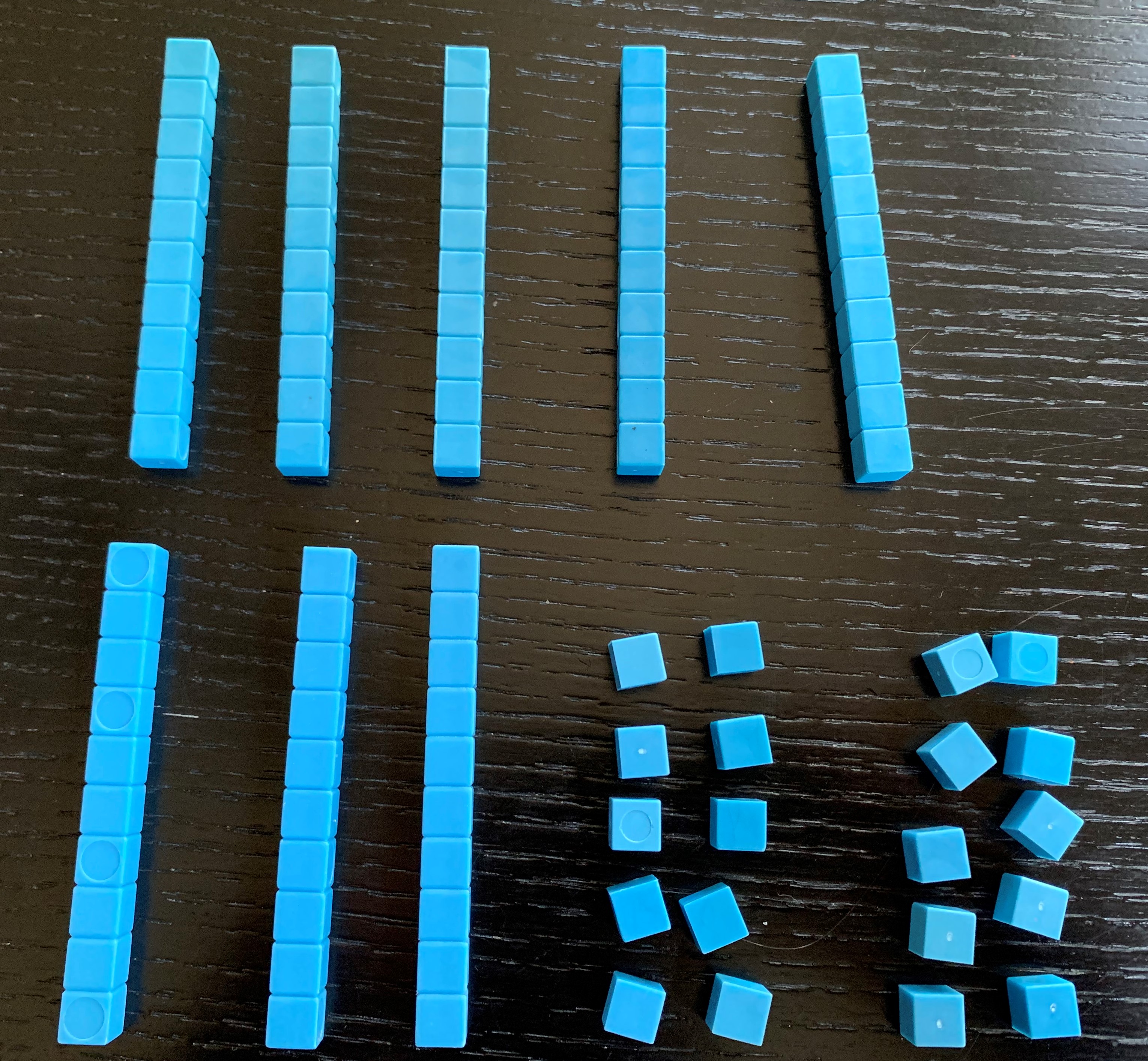 Base ten blocks. 8 tens, 20 ones.