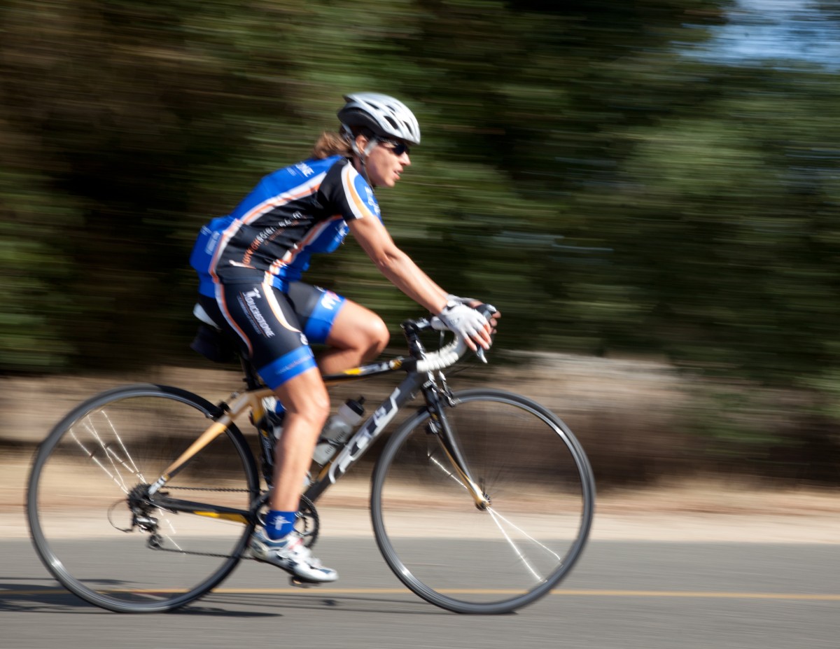 A woman biking.