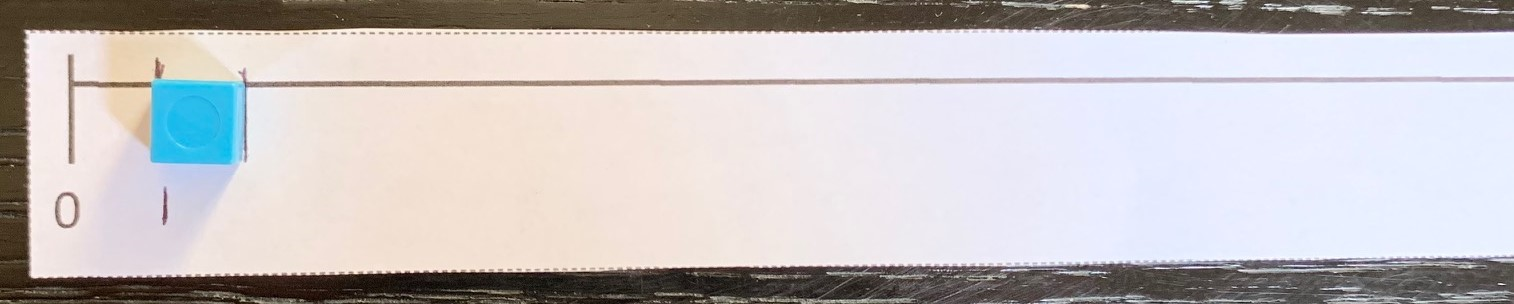 Ruler template with centimeter cube. One centimeter marked.