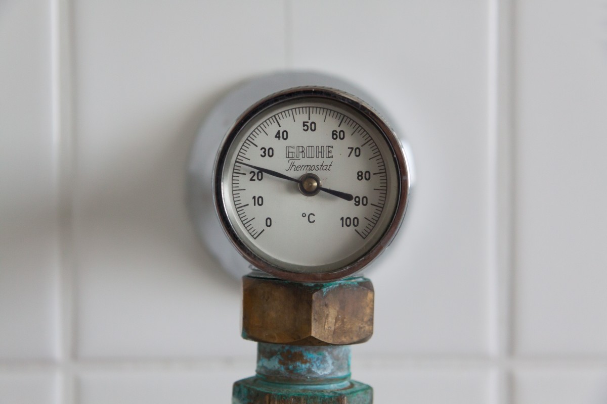 an antique Grohe temperature gauge