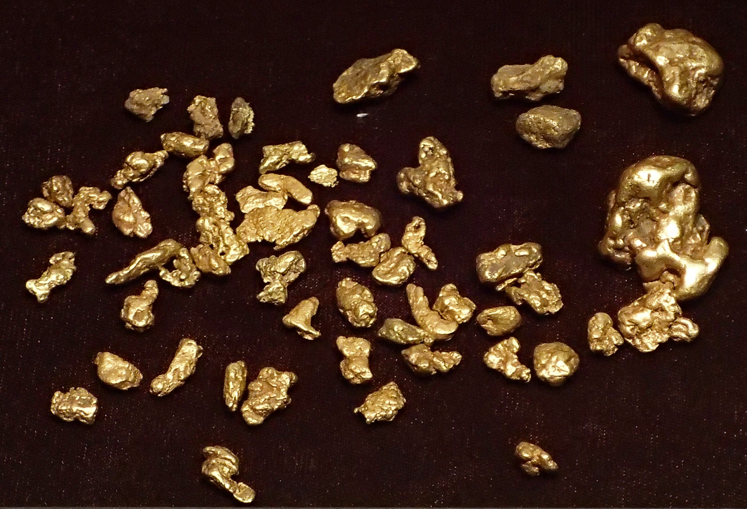 Photograph many gold nuggets