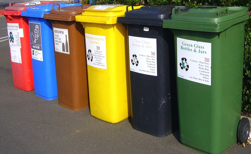 A photo of recycling bins.
