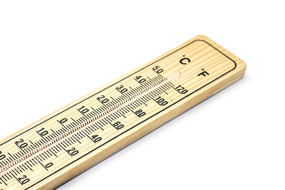 a wooden thermometer