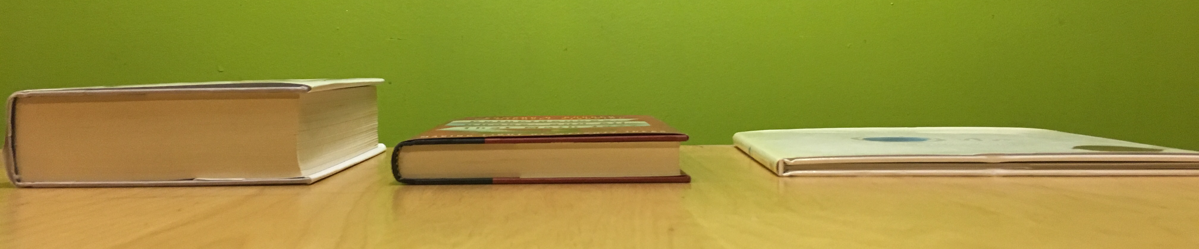 Image of 3 books. Left book is longest, middle book is 276 pages, right book is shortest.