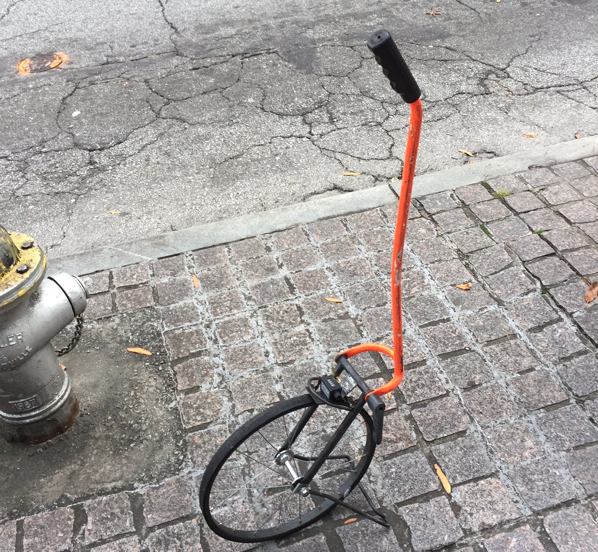 A picture of a trundle wheel.