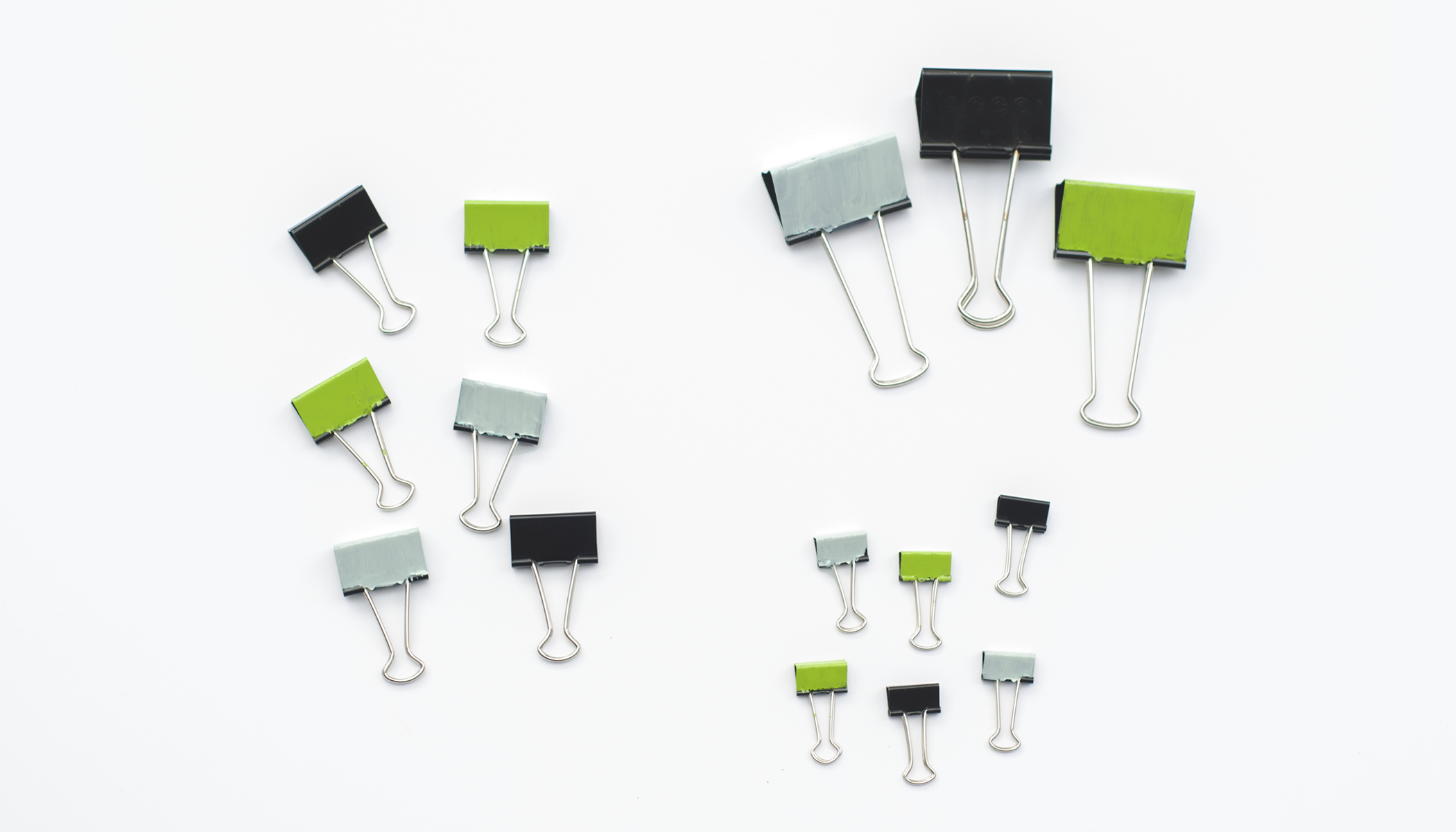 A collection of binder clips.