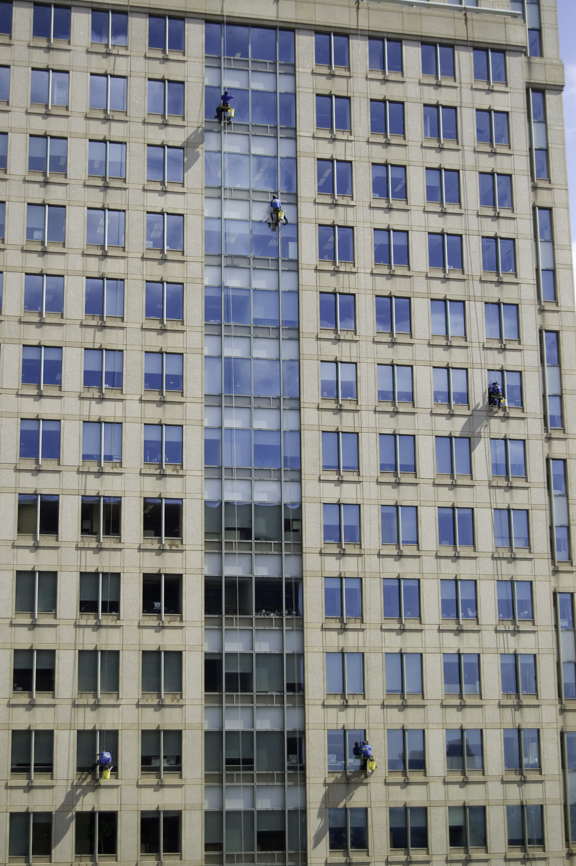 Photo of window washers on a building.