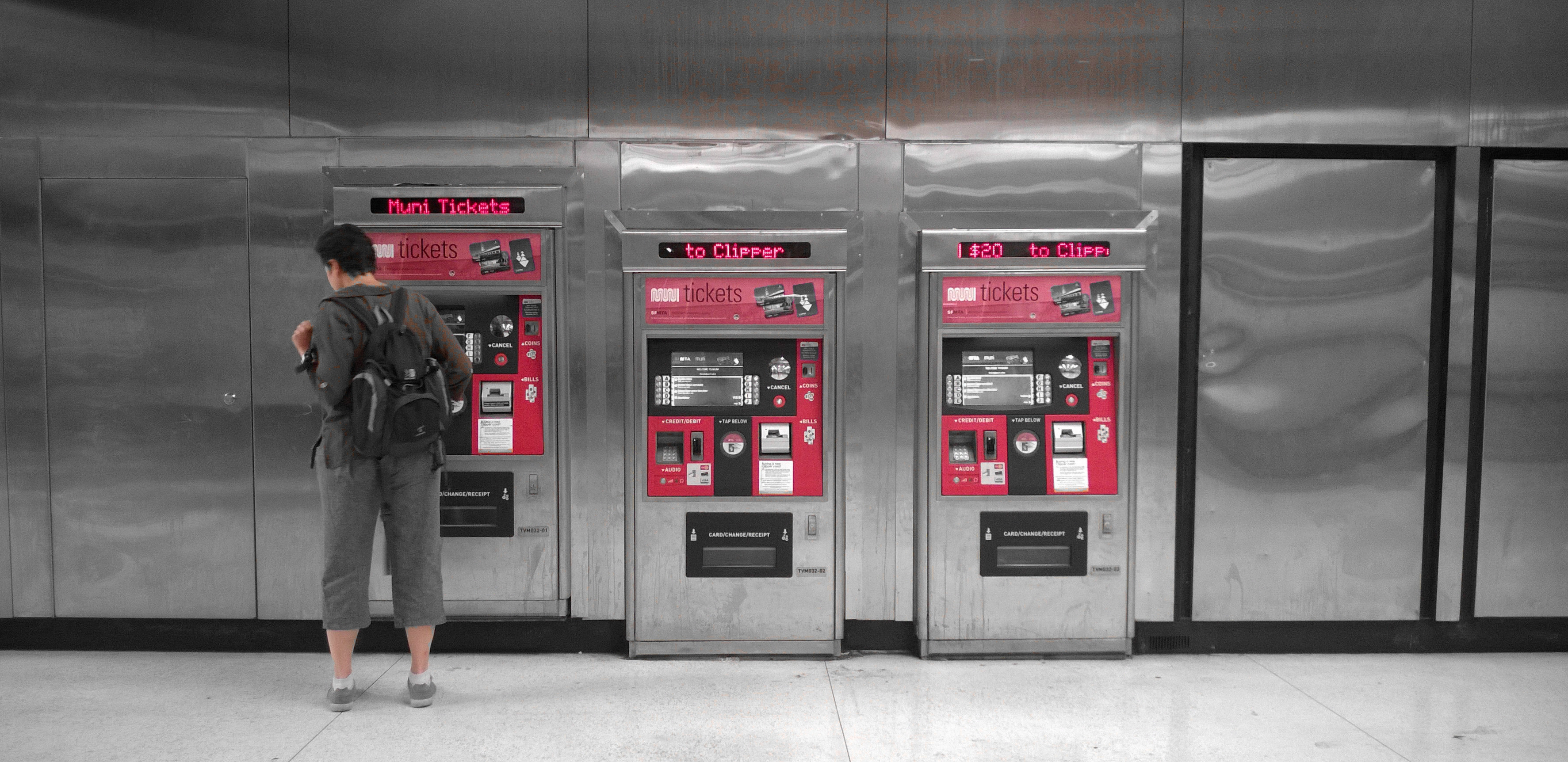 Person at a fare card machine