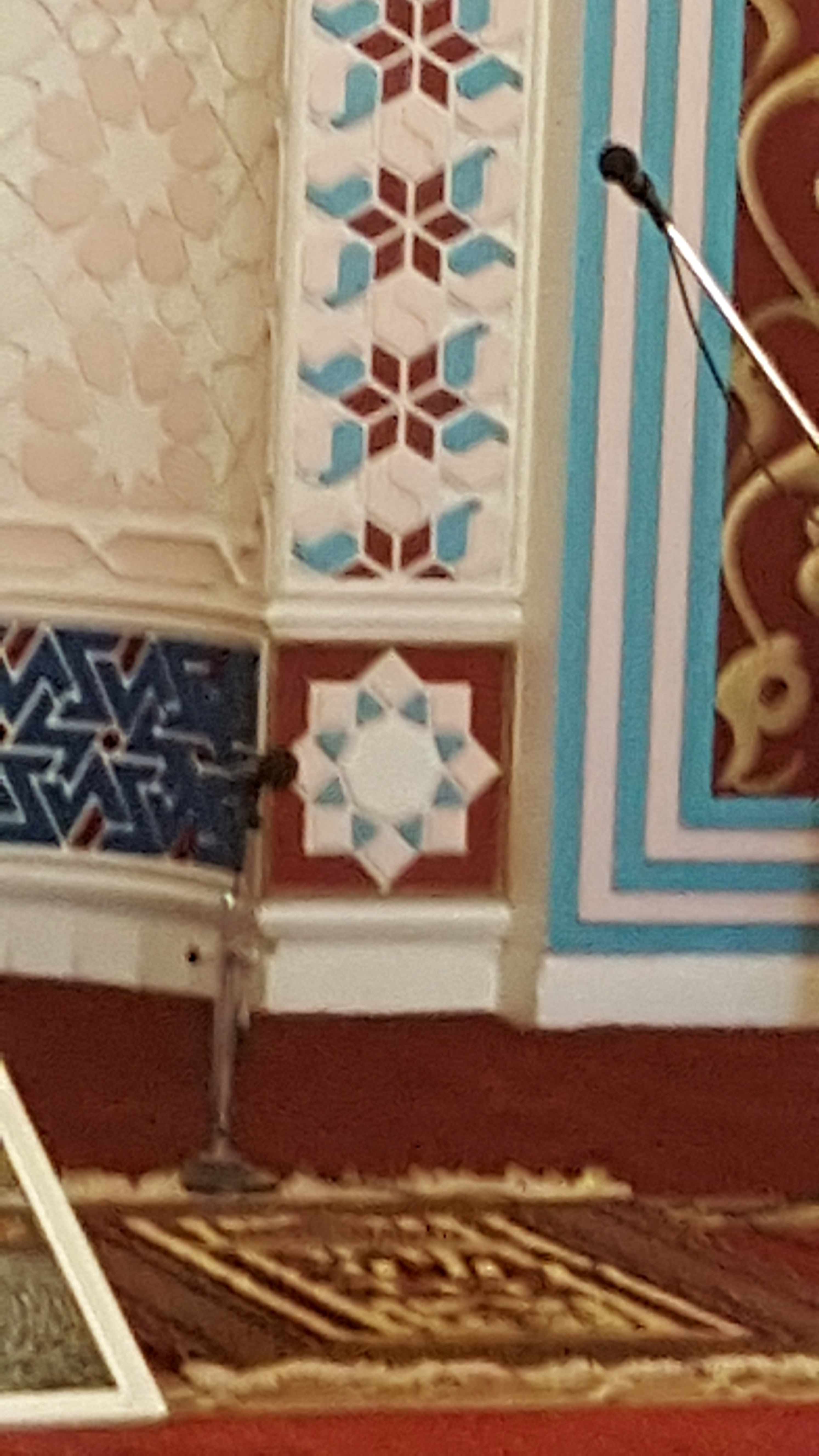 Colorful geometric mosaic star patterns, made with hexagons, squares and triangles.