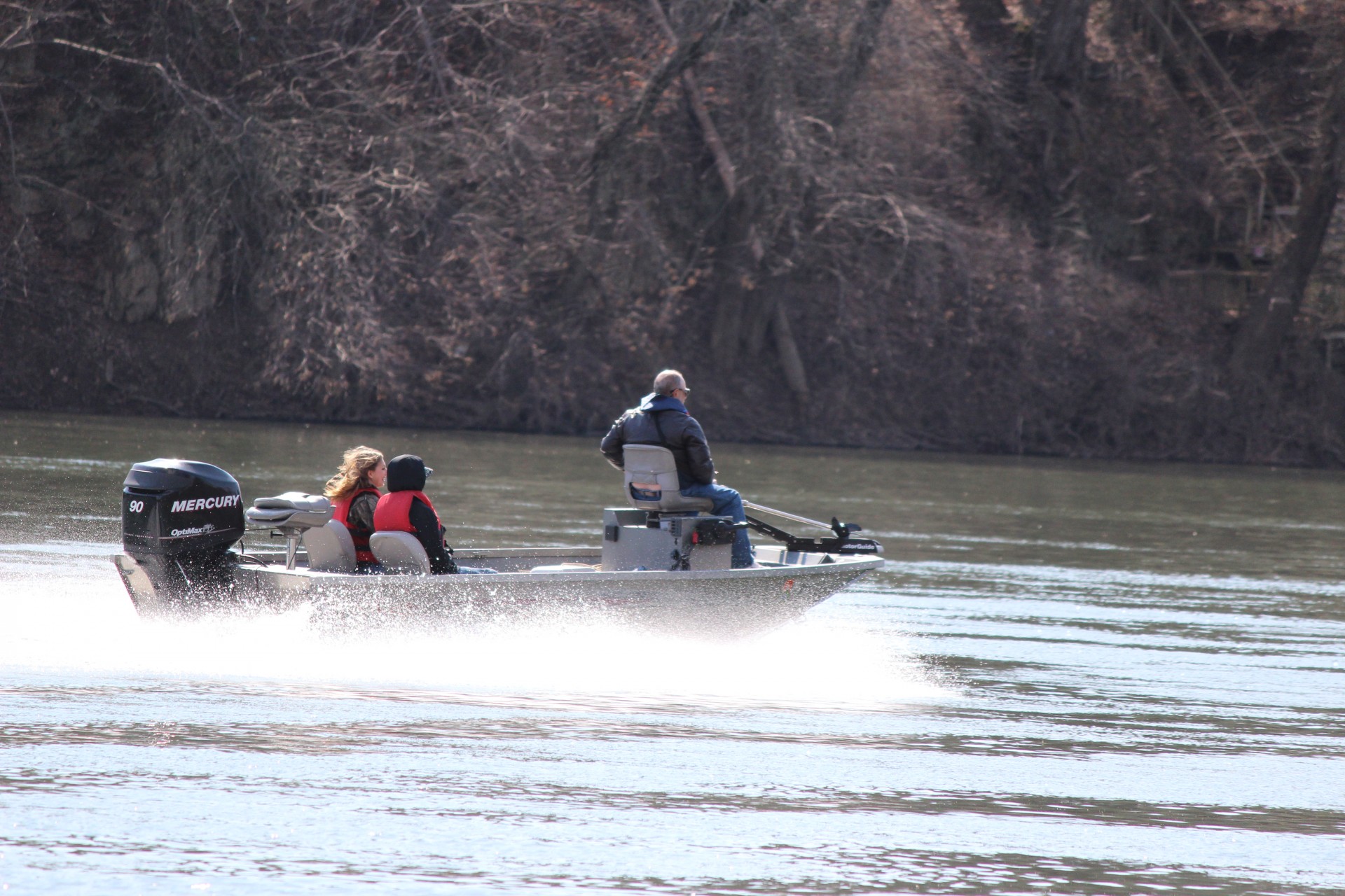 family boating on a river