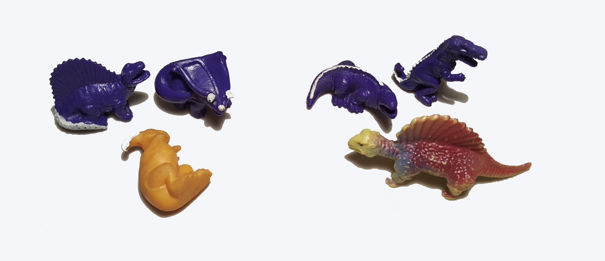 A collection of dinosaur figurines.