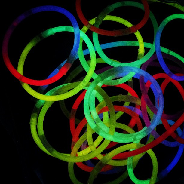 Picture. Many neon bracelets.