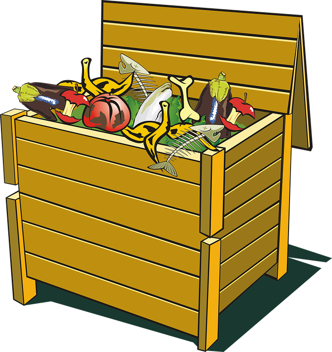 trash dumpster filled with eaten and rotten food.