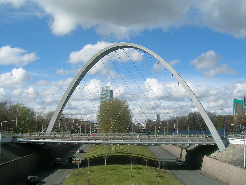 Picture of bridge with arch above it.