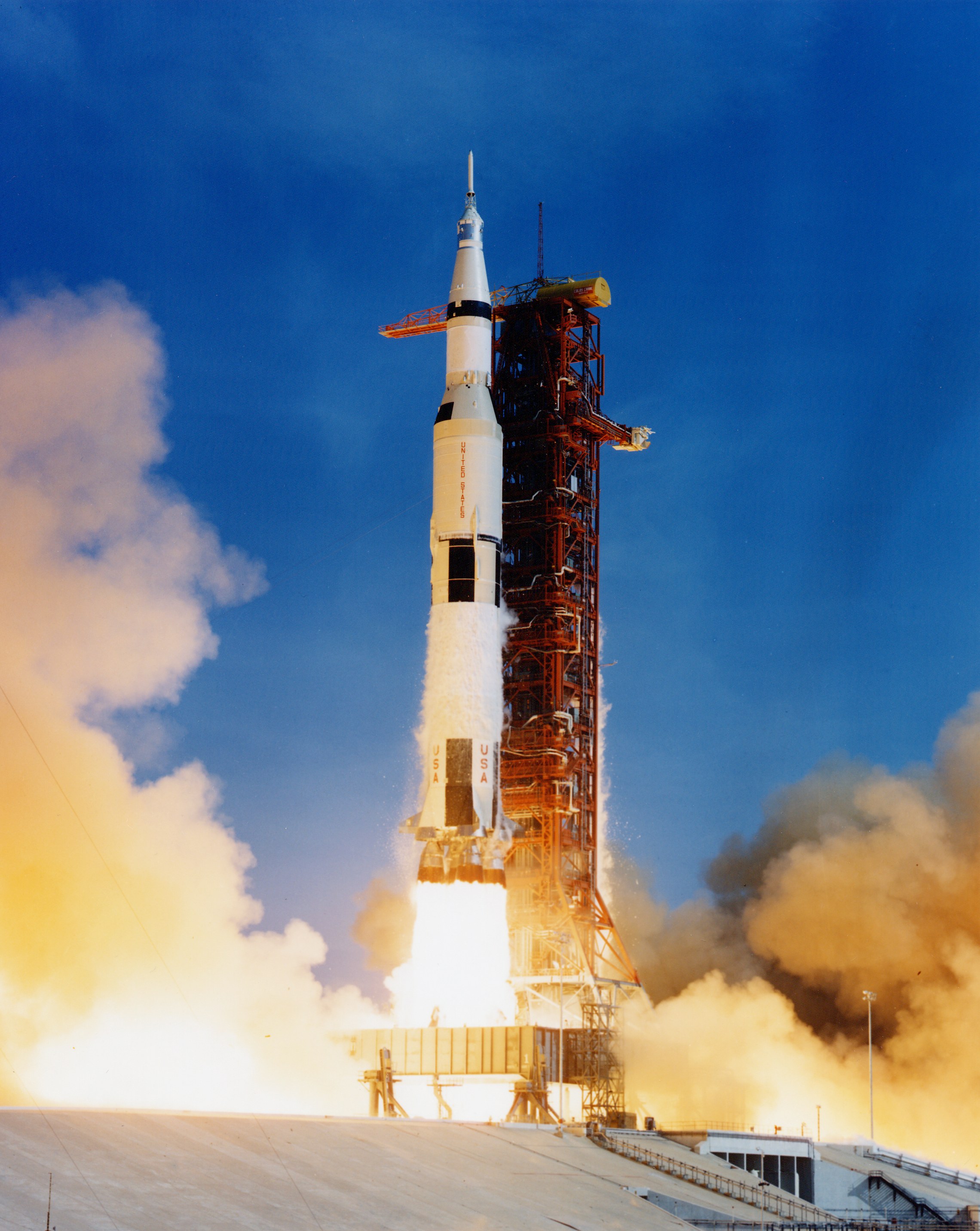 A photo of the Saturn Five rocket lifting off.