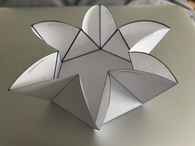 An origami hexagonal coin purse.