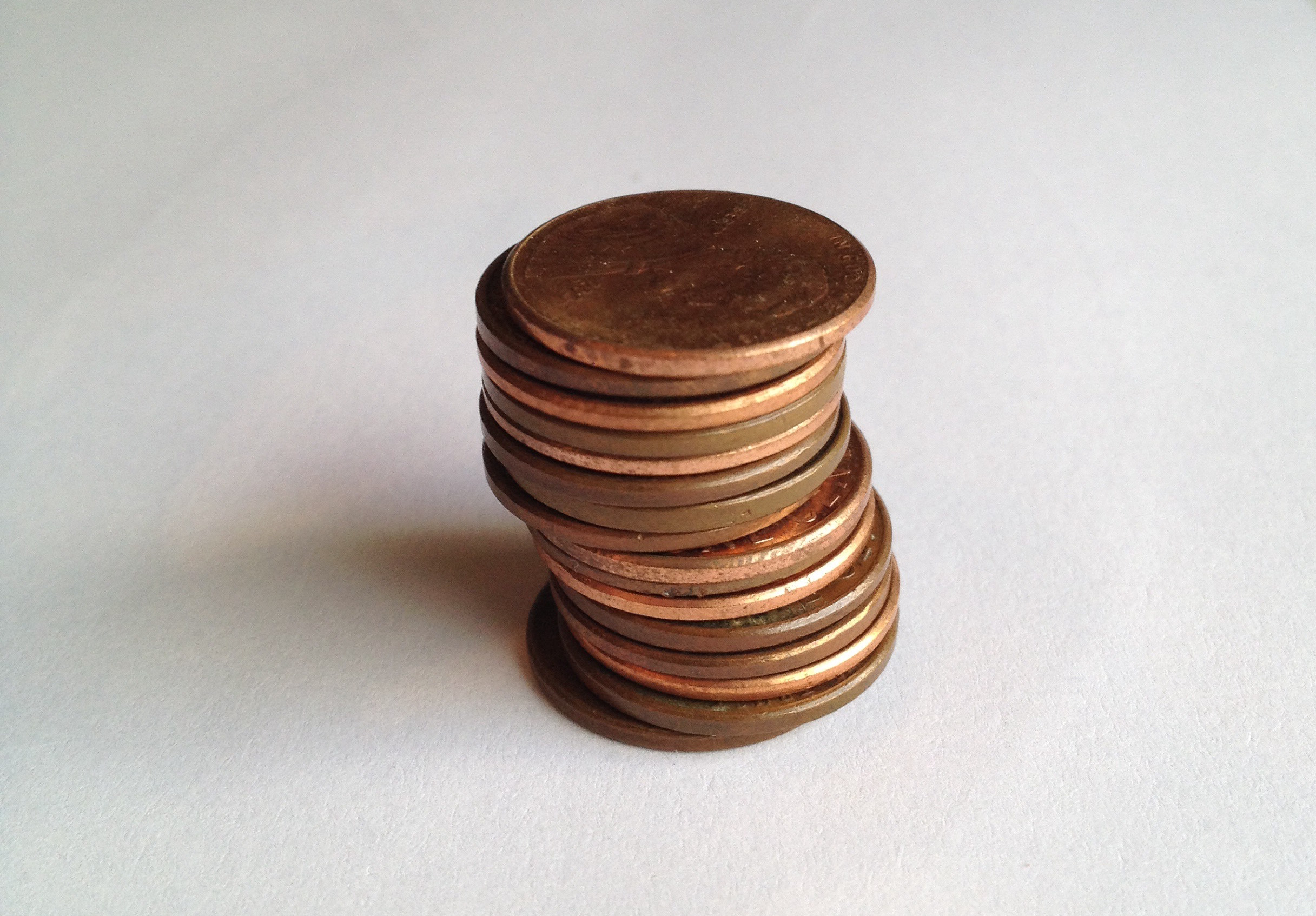 Photograph of a stack of 15 pennies.