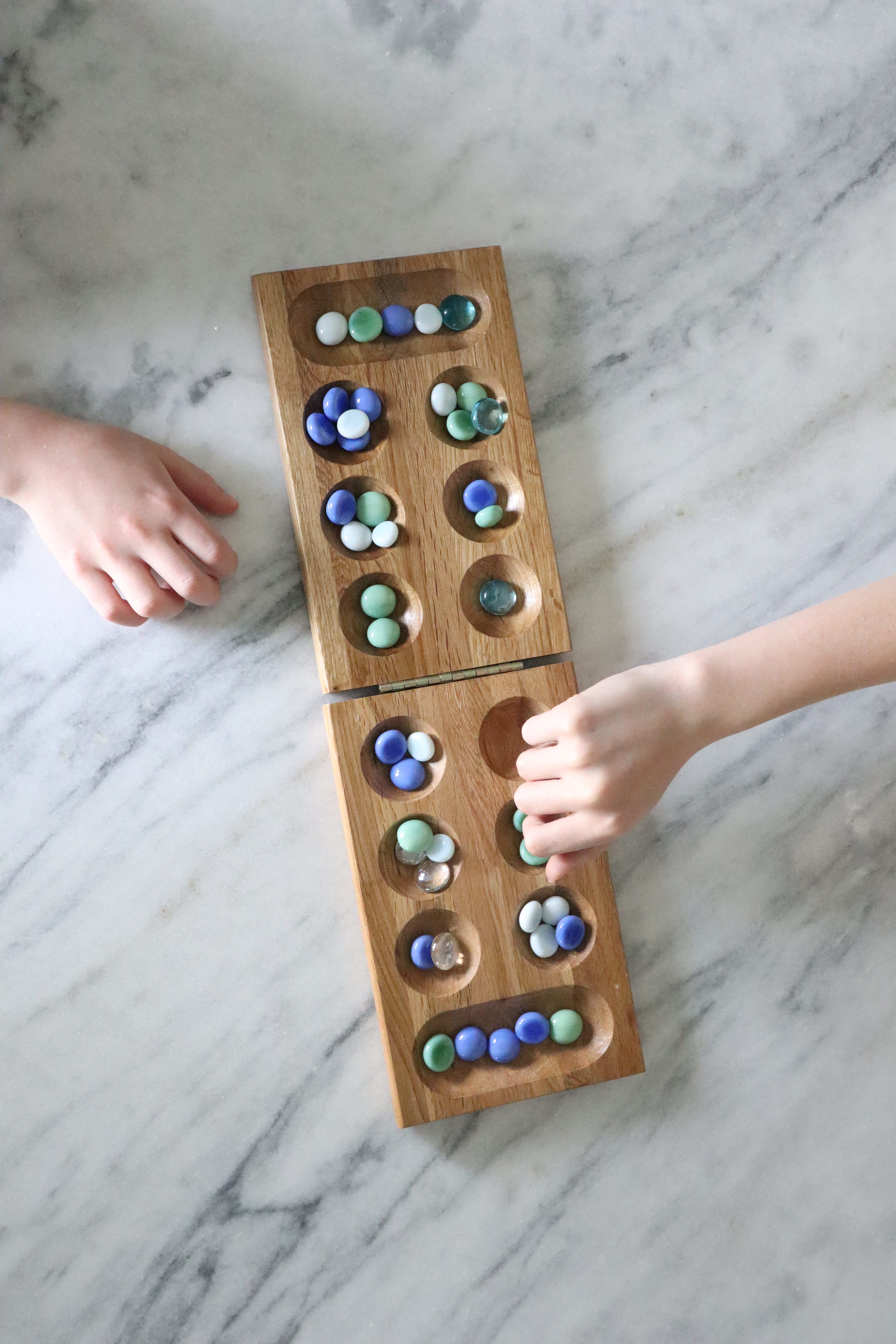 A game called Mancala in progress.