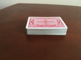 A photo of a deck of playing cards stacked neatly.