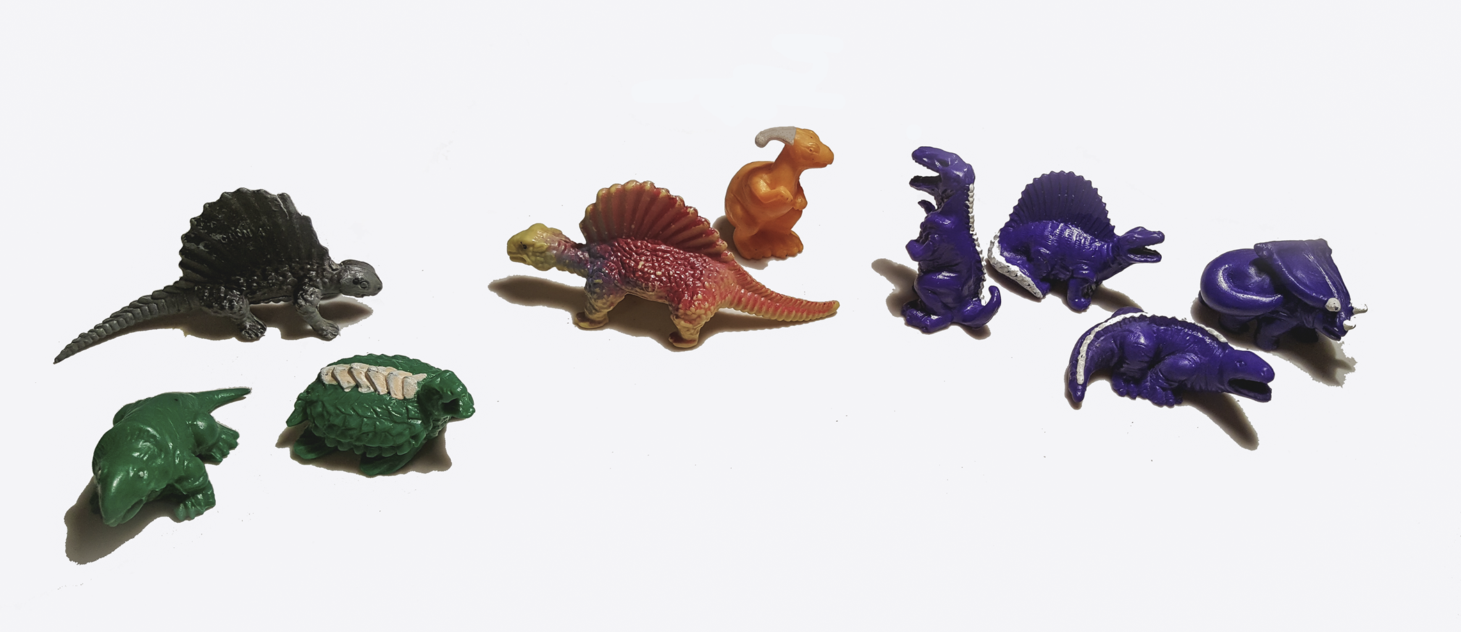 A collection of dinosaur figurines.